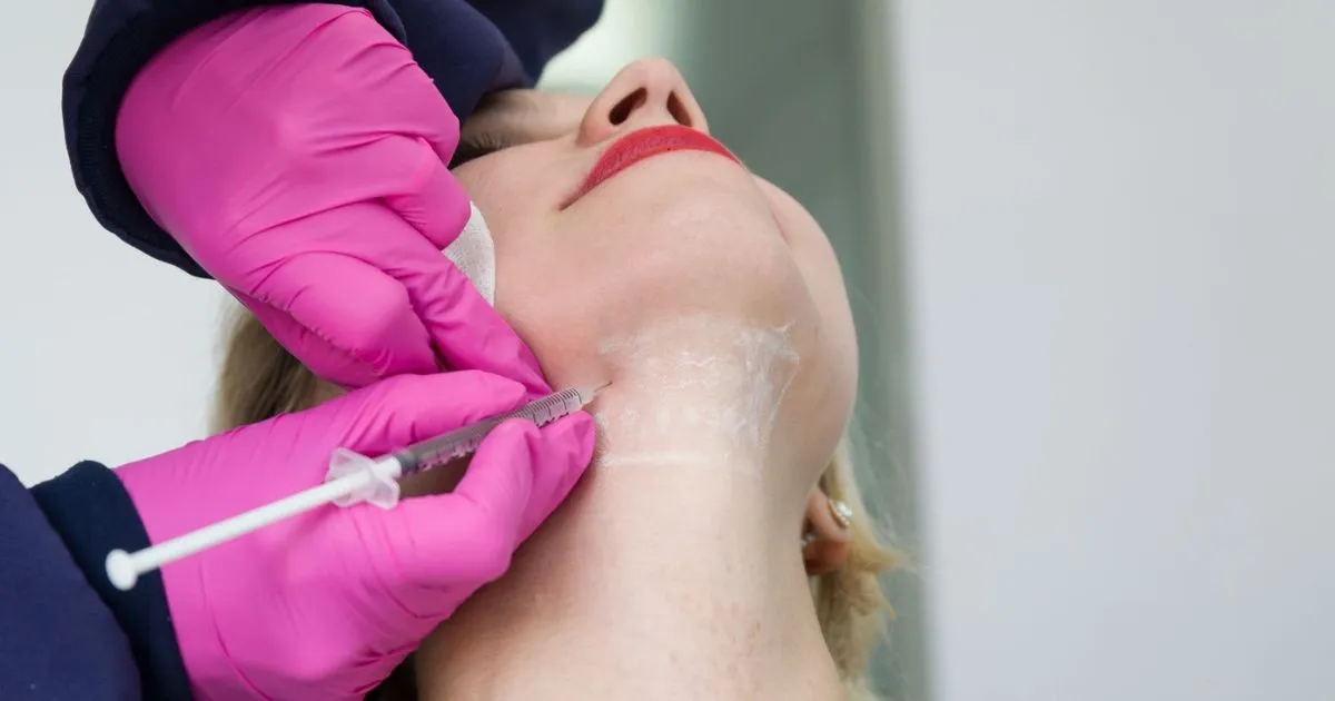 Kybella injection for double chin treatment on a woman in Bend, OR